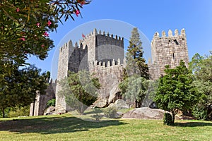 Castelo de Guimaraes Castle. Most famous castle in Portugal photo