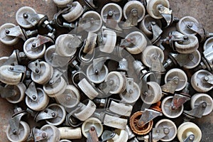 Casters wheels behind a shed abandoned