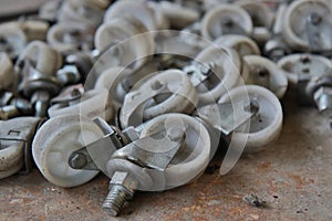 Casters wheels behind a shed abandoned