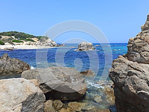 Sardinia , Punta di Santa Giusta, beach and rocks 4 photo