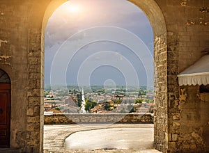 Castiglione del lago Trasimeno, Umbria, Italy. August 2020. Amazing view from the entrance door in the walls of the old town.