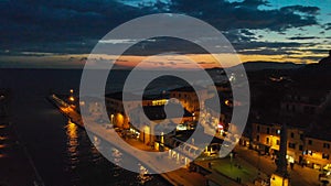 Castiglione della Pescaia at night, aerial view after sunset