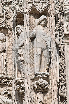 Castilian medieval soldier and knight on the gothic facade of the National Sculpture Museum