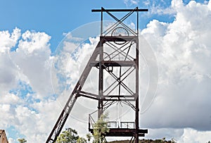 Castillete a metallic structure in the shape of a tower in La Zarza-Perrunal Village, Huelva, Andalusia, Spain. Old mine shaft photo