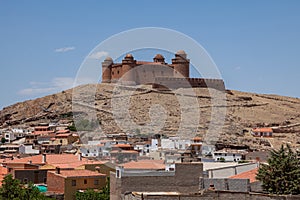 The Castillo de la Calahorra is on a hill, cerro Amesetado, 1240 m above sea level in the flanks of the mighty Sierra Nevada.