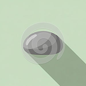 Is casting a long shadow to the right, indicating a light source from