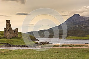 Castle Ardvreck at Loch Assynt with mountain, Scotland.