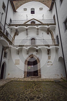 Castle in Banska Stiavnica town in cloudy day after rain