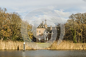 Castle behind reed in river Oude IJssel