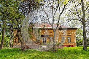 Castle on Biserno Ostrvo Pearl Island in the natural surroundings og a branch of the river, socalled dead Tisa river.