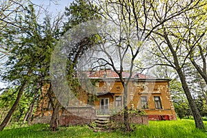 Castle on Biserno Ostrvo Pearl Island in the natural surroundings og a branch of the river, socalled dead Tisa river.