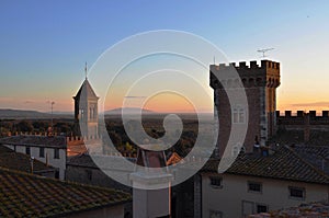 Castle of Bolgheri and Elba island in sunset