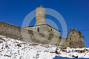 Castle of Campo Ligure under the snow photo
