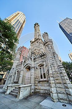 Castle in Chicago city, historic, original water tower on blue sky day, tourism, tourist attraction