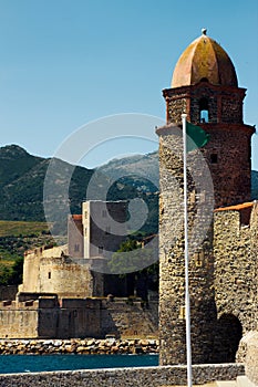 Castle on the coast and a gate with tower