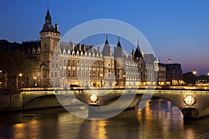 Castle Conciergerie and bridge of Change