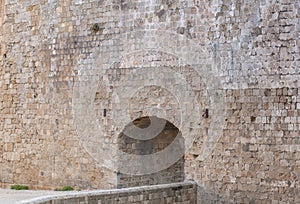 Castle entrance with big stone architecture wall background