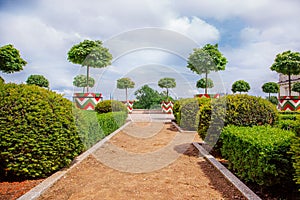 Castle gardens in front of Royal Castle in Warsaw, saxon facade Poland. Landscape design, park with shrubs and green lawns