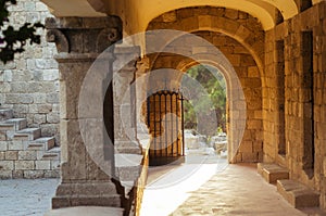 Castle gate way to yard of ancient greek temple