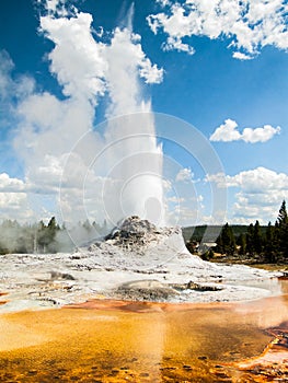 Castle Geyser Erupting with Colorful Pool