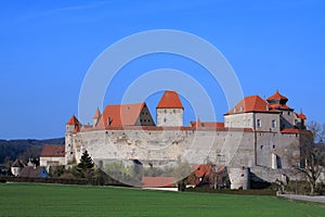 Castle Harburg stronghold by blue sky photo