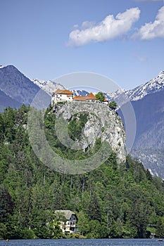 a castle high on the top of the moountains in bled in slovenia