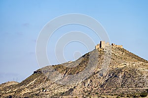 Castle on hill, Tabernas desert, Spain photo