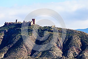 Castle on hill, Tabernas desert, Spain photo