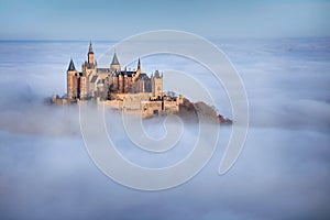 Castle Hohenzollern over the Clouds photo