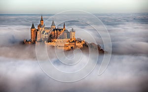 Castle Hohenzollern over the Clouds photo