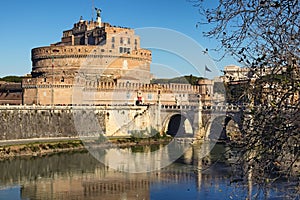 Castle of Holy Angel Castel Sant Angelo and Holy Angel Bridge over the Tiber River in Rome at sunny winter day. Rome. Italy