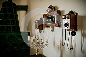 Castle interior, Retro style room with baroque and renaissance furniture and Very old Retro wooden telephone on wall, Castle