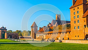 Castle in krakow poland 2019 - In the backyard, with a blue sky, green grass