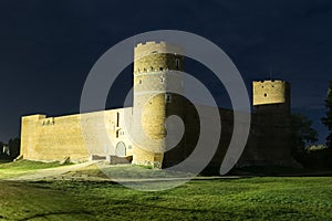 Castle of the Masovian Dukes at night in Ciechanow Poland photo