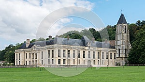 Castle of Mery sur Oise with the church tower on the right