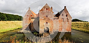 Castle with moat in Denmark photo