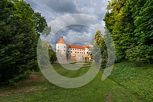 Castle Mokrice on a spring evening with dramatic clouds