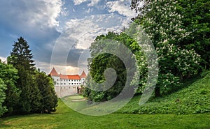 Castle Mokrice on a spring evening with dramatic clouds