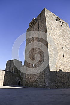 The Castle of Olivenza under blue sky photo
