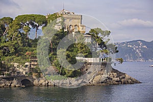 Castle on Portofino shore. Italian landscape