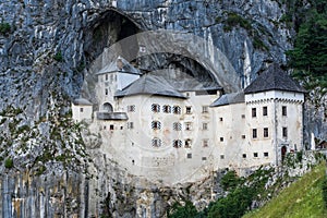 Castle of Predjama, built within a cave mouth in Slovenia.