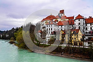 Castle on river in europe photo
