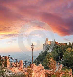 Castle Rocca della Guaita against sunset in San Marino republic, Italy