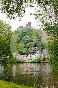 Castle ruin over bernkastel village and moselle river