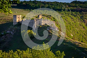 Castle ruins on the hill in Kudryntsi. Podilia region, Ukraine.