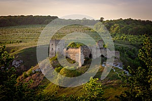 Castle ruins on the hill in Kudryntsi. Podilia region, Ukraine.