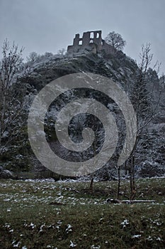 Castle ruins on a hill on a snowy day in Germany