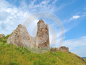 Castle ruins under stormy sky