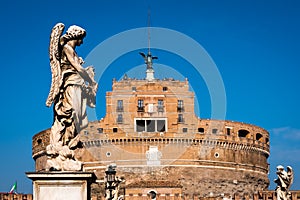 The castle Sant Angelo an the statue of the bridge in Rome