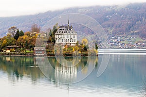 Castle Seeburg on the Iseltwald in the turquoise Brienz Lake